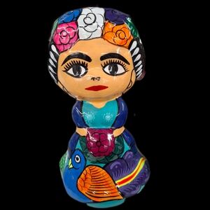 Colorful Ceramic Figurine with Floral Design